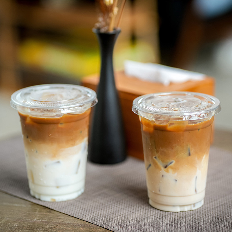 Two lattes on a table