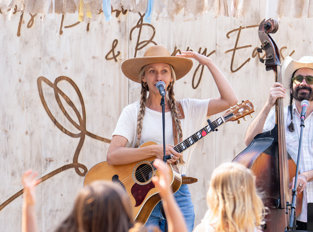Little Folk Club singing to children