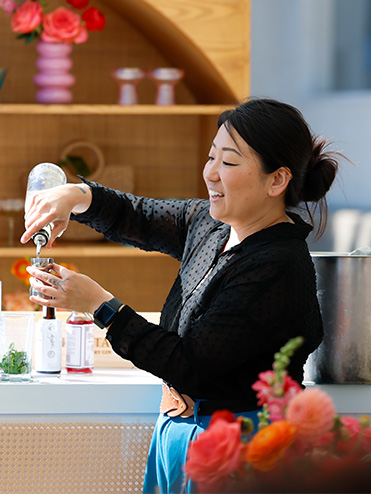 Woman teaching a cocktail masterclass