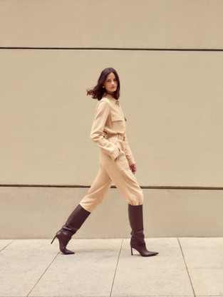 Woman wearing the Stretch Viscose Jumpsuit from St. John