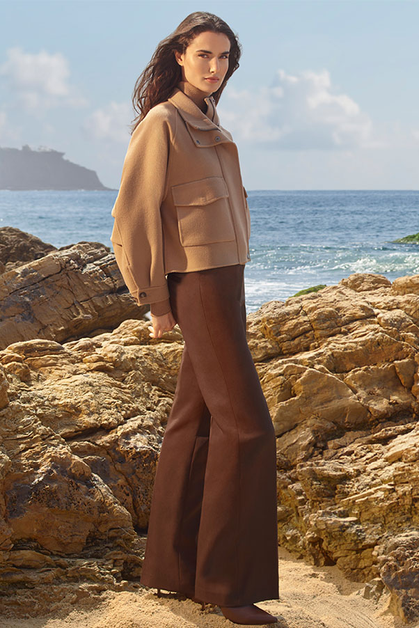Woman posing on the beach