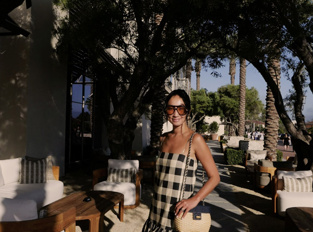 Woman posing in front of RH