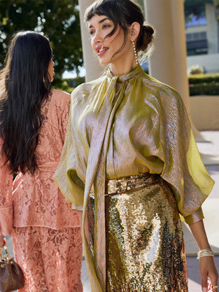 Model in sunlit glamoratti outfit